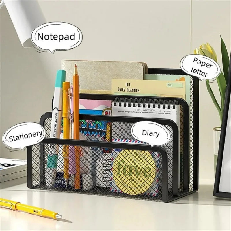 Black mesh desk organizer with stationery items including a notepad, paper letters, and a diary.
