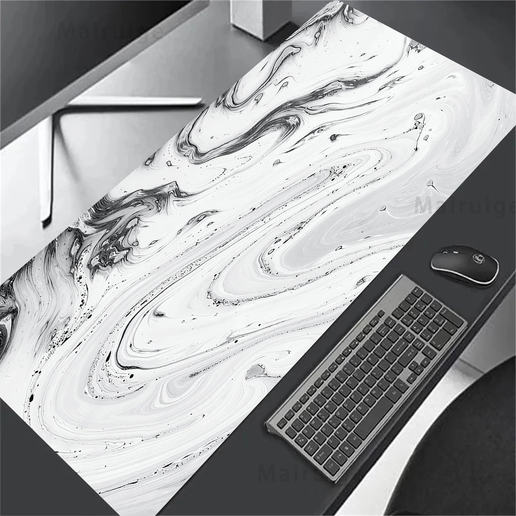 Marble-patterned desk mat with keyboard and mouse on a desk