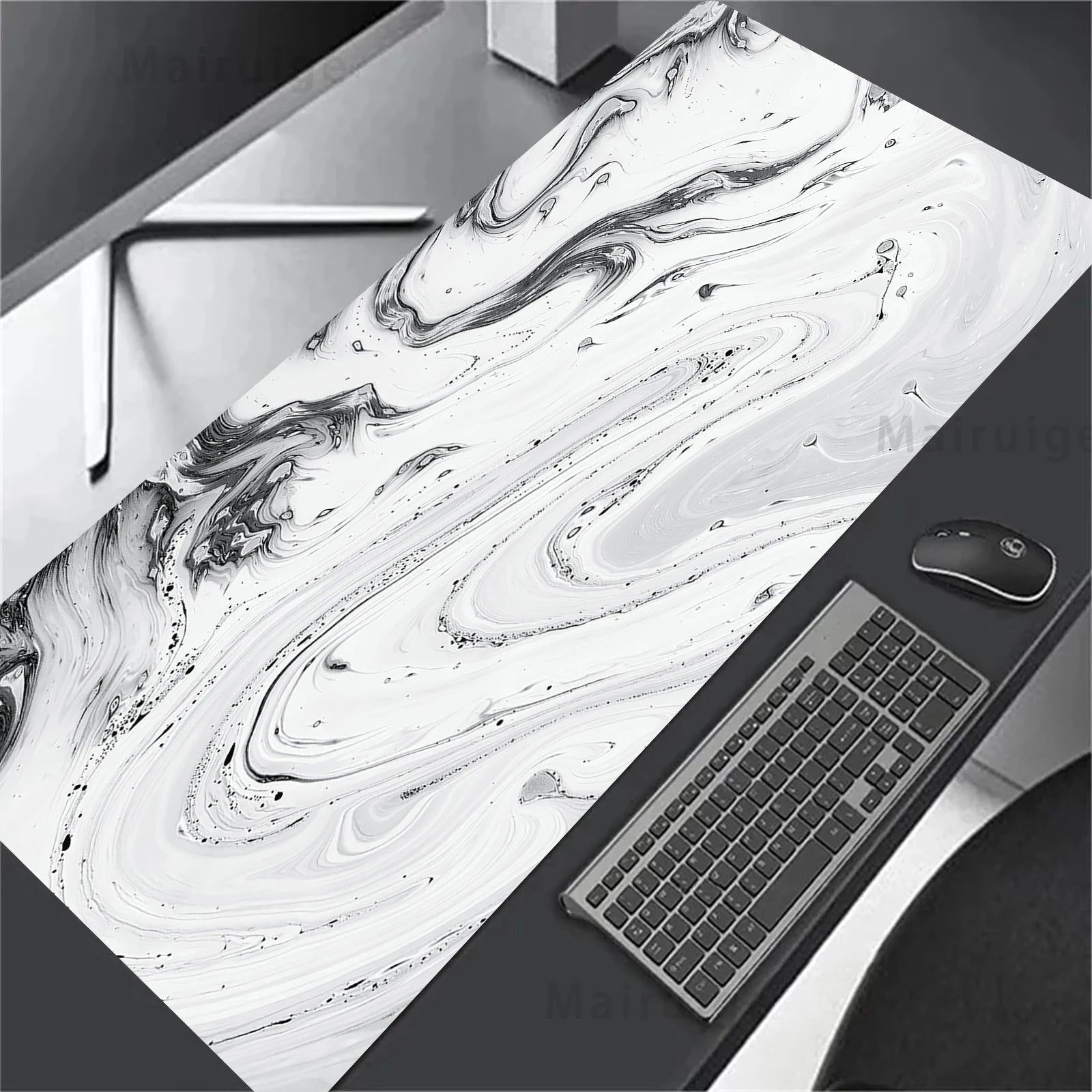Marble-patterned desk mat with keyboard and mouse on a desk