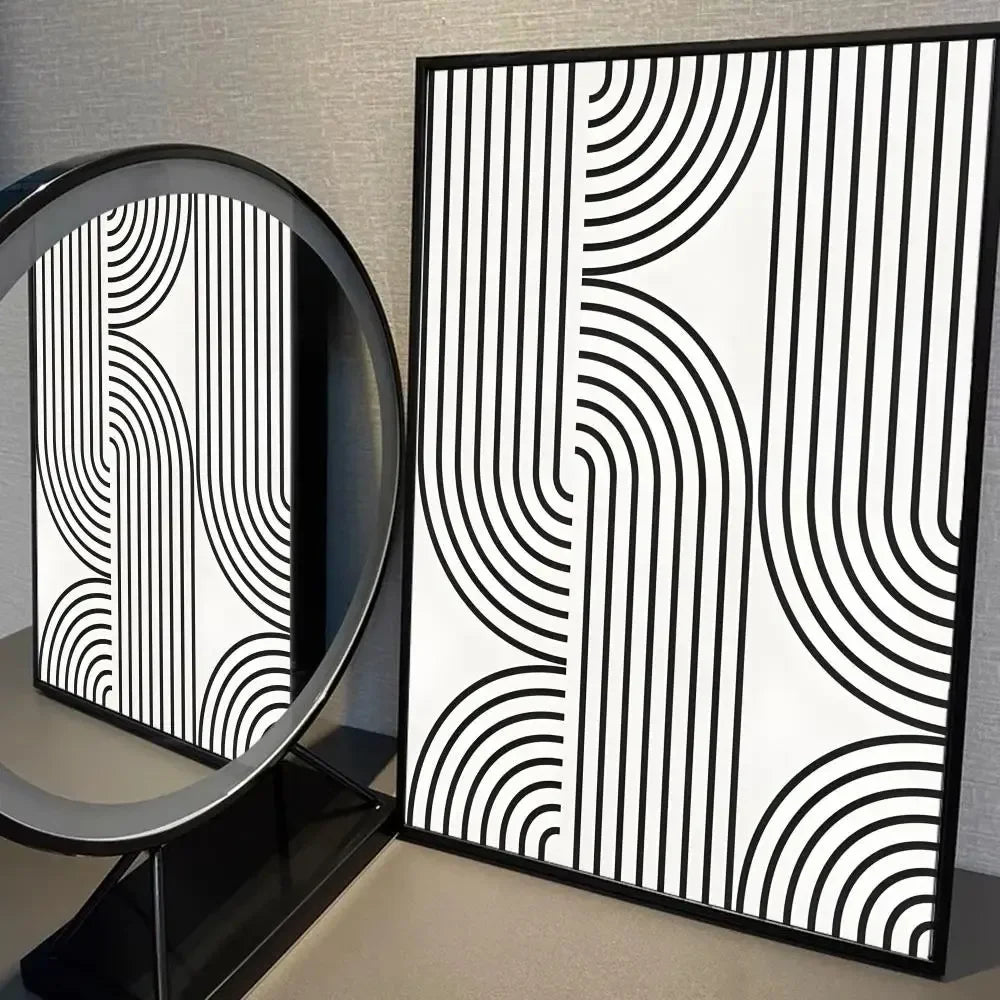 Decorative wall art with black and white geometric pattern on a plain background