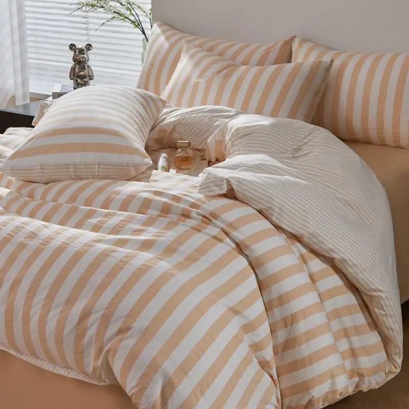Peach and white striped Polyester bedding set with soft minimalist bedroom styling