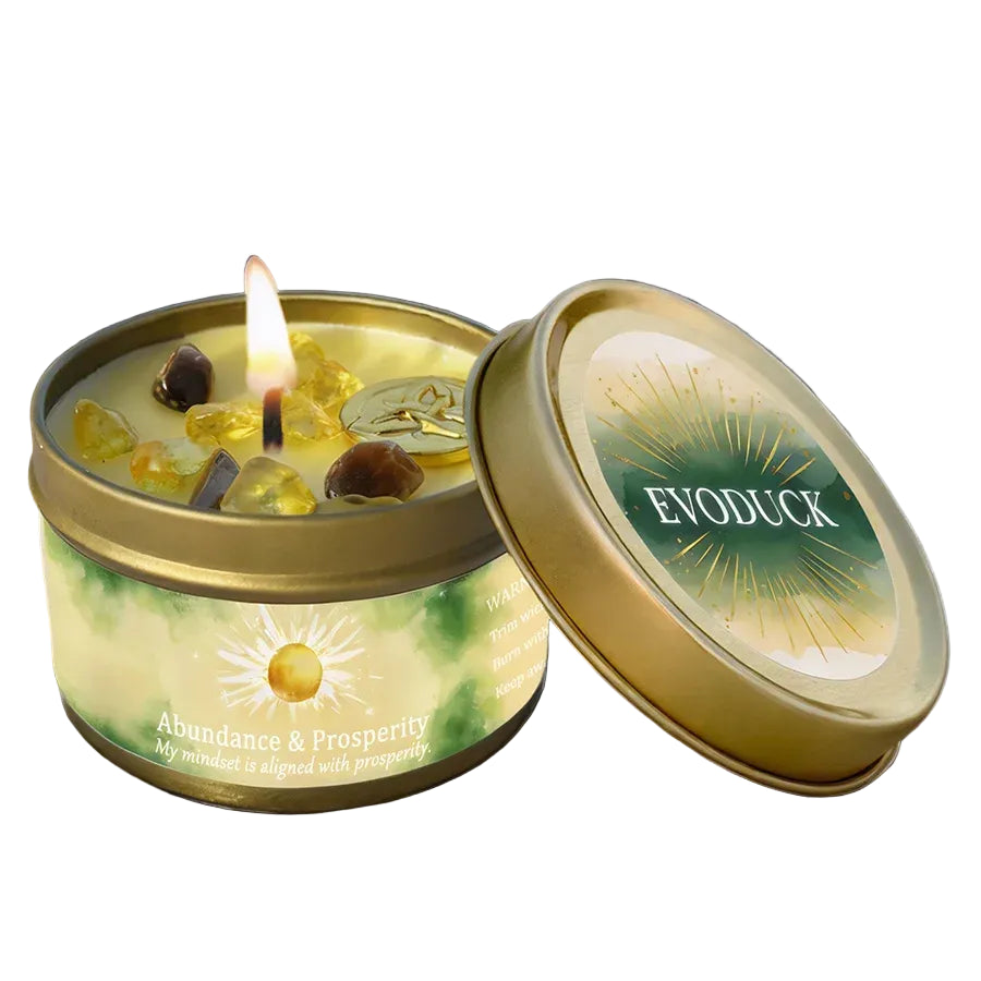 Abundance & prosperity scent in a tin with a lit wick.