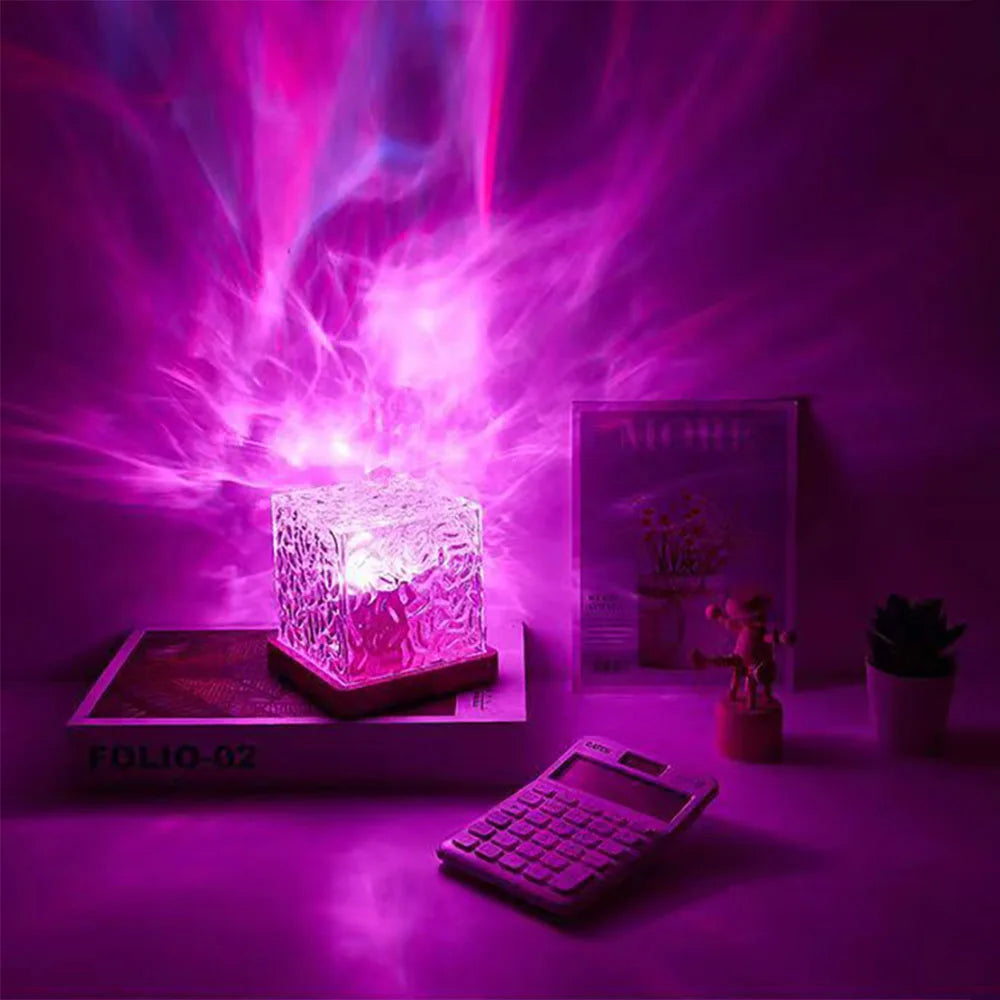 Futuristic glowing cube on a desk with a purple light effect