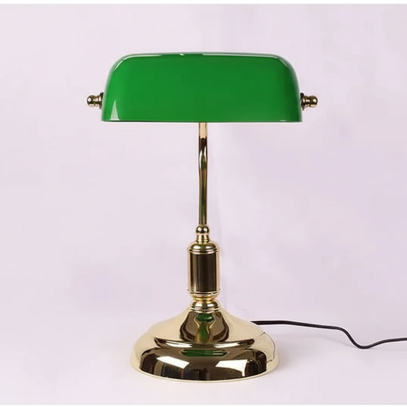 Green glass table lamp with polished gold base in a classic modern banker style