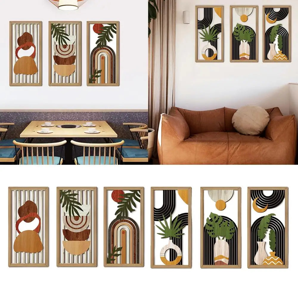 Set of abstract wall art pieces in a modern interior setting with a brown sofa and dining table.