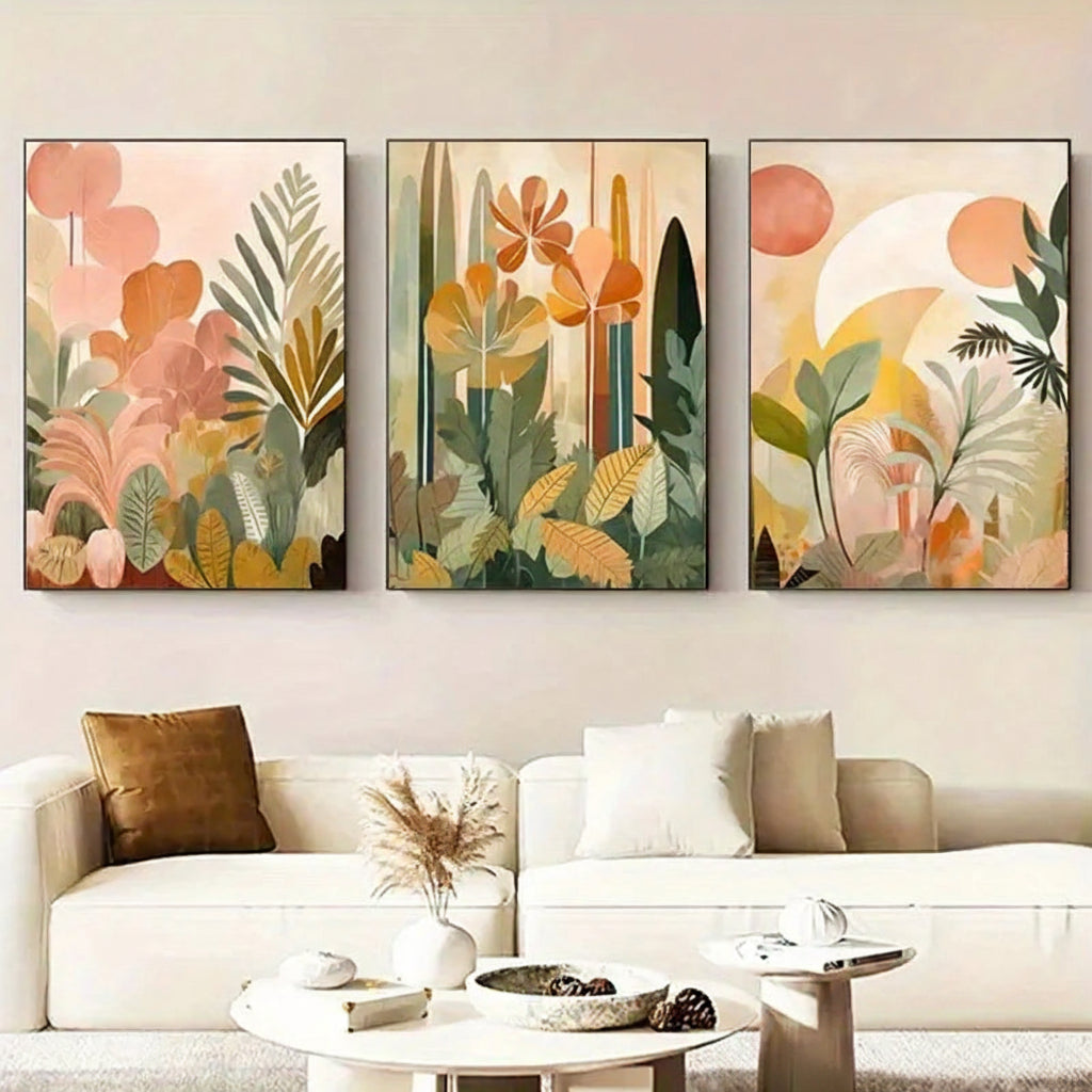 3-piece floral canvas print set styled above a cream sofa in soft peach, sage, beige, and golden tones