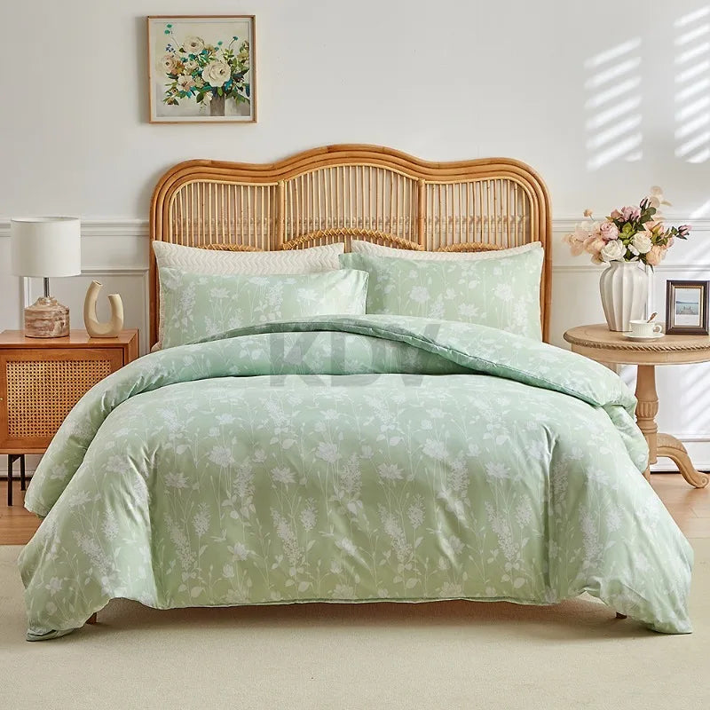Sage green duvet cover set with delicate white meadow floral print and matching pillowcases