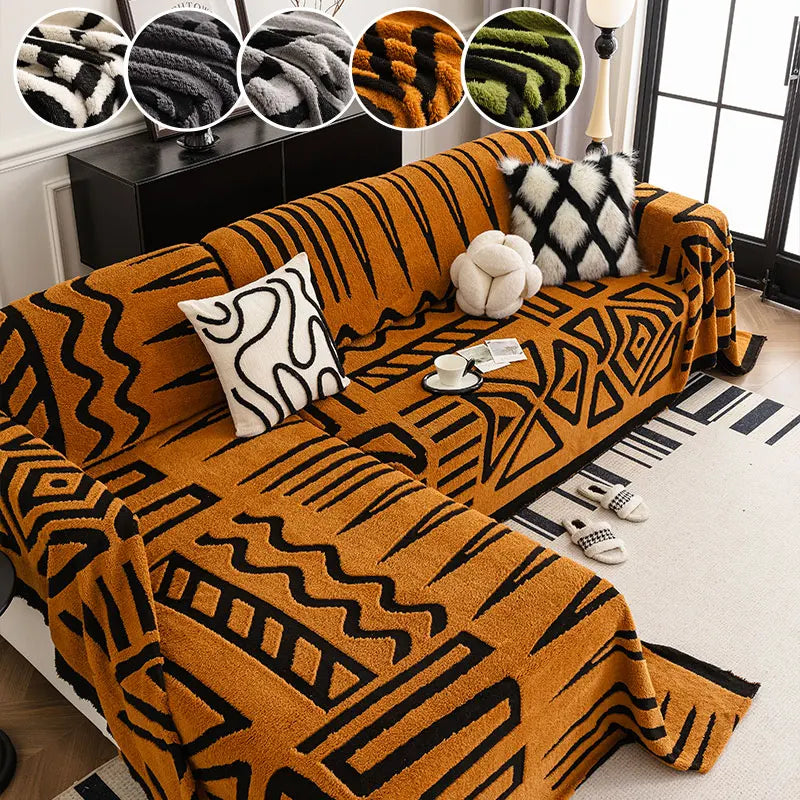 Rust orange tribal print sofa cover on L-shaped couch with cushions