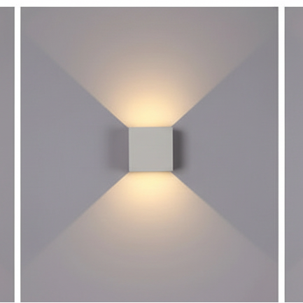 Modern wall-mounted light fixture on a plain background