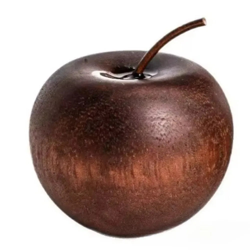 Brown apple shaped oil diffuseron a white background