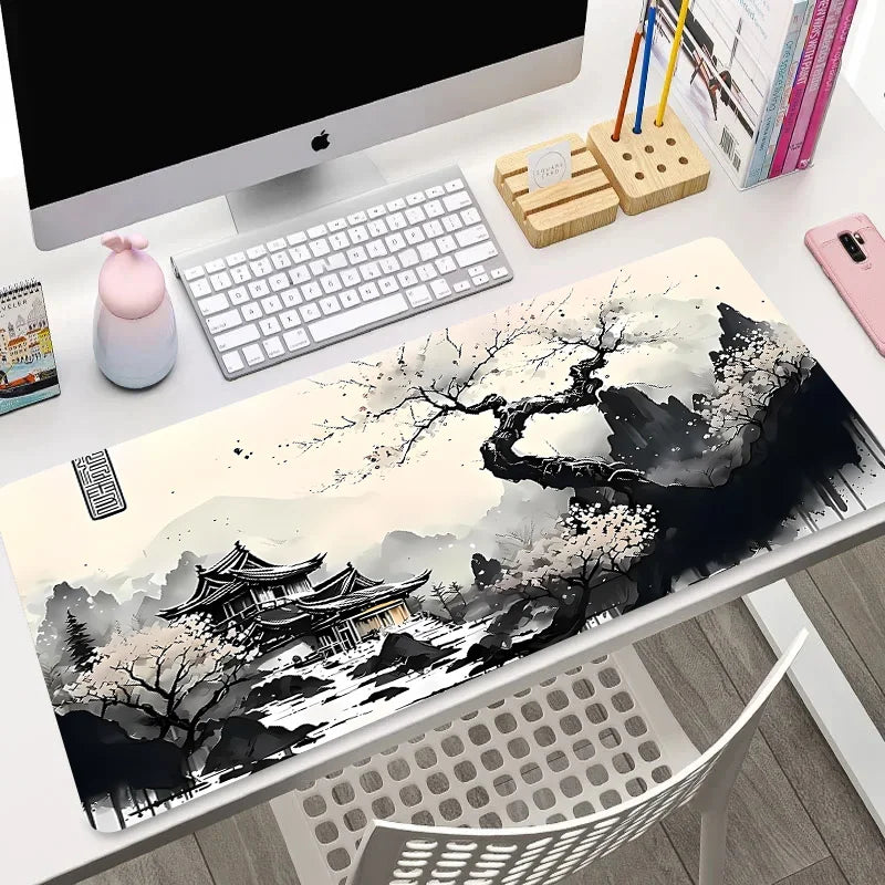 XL mouse pad with ink wash blossom tree, pagoda, and mountain scene on a cream background, flat and rolled