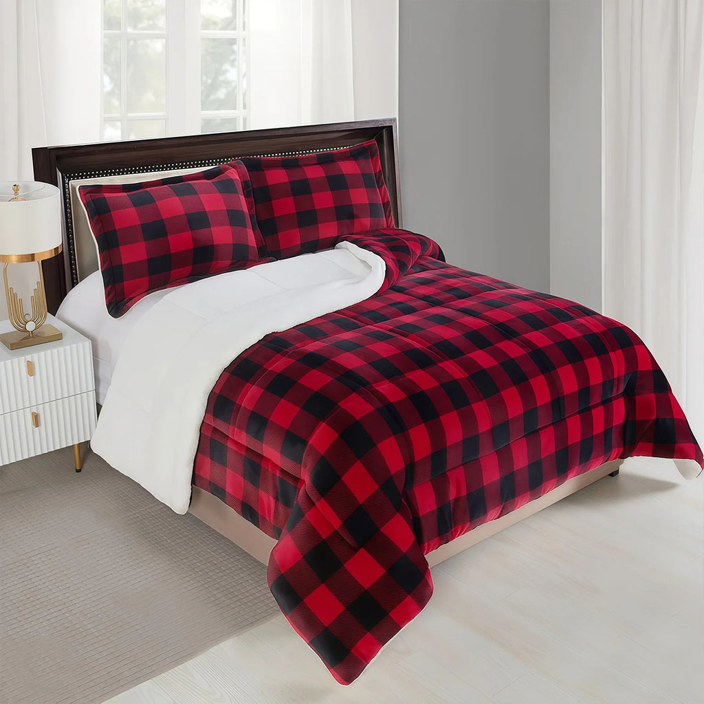 Bed with red and black checkered comforter and pillows in a bedroom setting.
