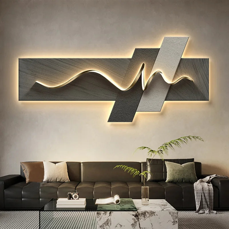 Modern living room with a decorative wall light fixture and a brown sofa.