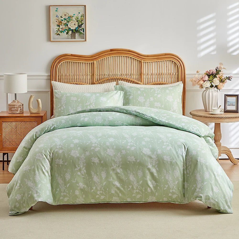 Sage green duvet cover set with delicate white meadow floral print and matching pillowcases