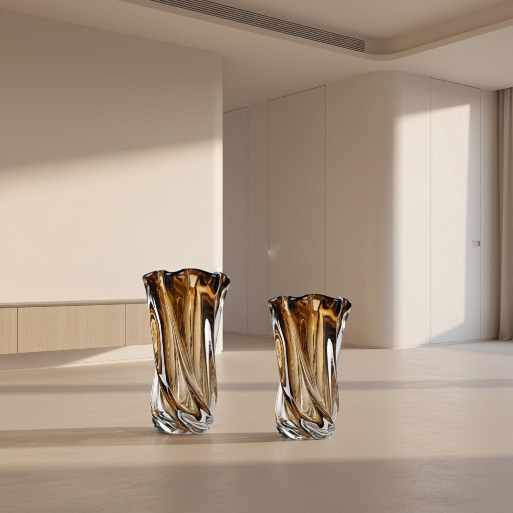 Two brown glass vases sit on a white background.