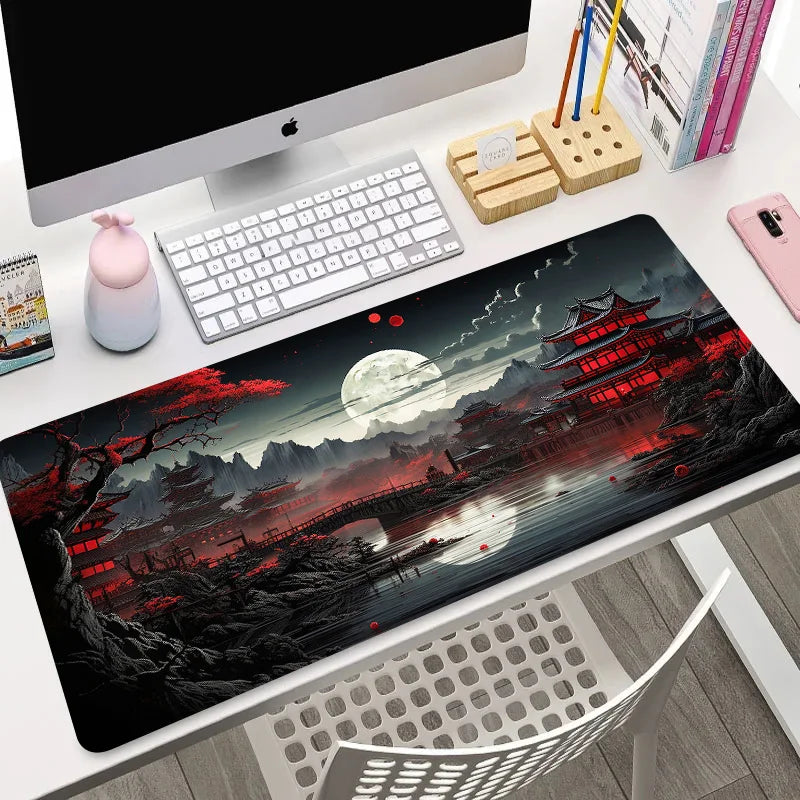 XL mouse pad with dark red and black Japanese temple scene under a full moon, shown flat and rolled