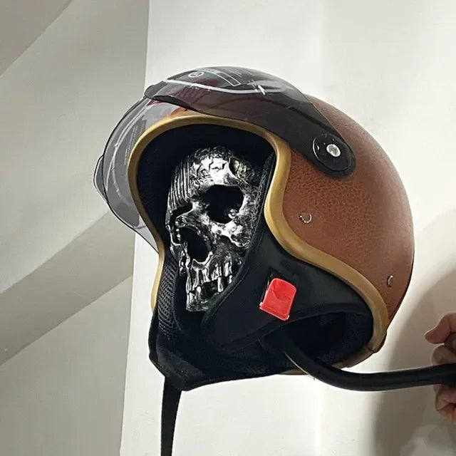 Grey Route 66 skull decorative wall hanger with curved wall hook.
