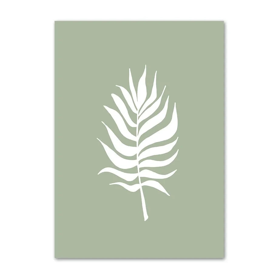 Green canvas print with a white palm leaf silhouette on a soft sage background.