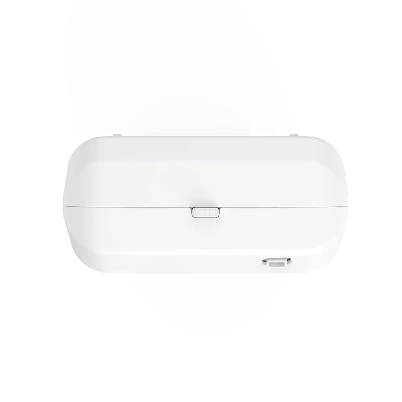 Top view of white wireless aromatherapy device on a white background