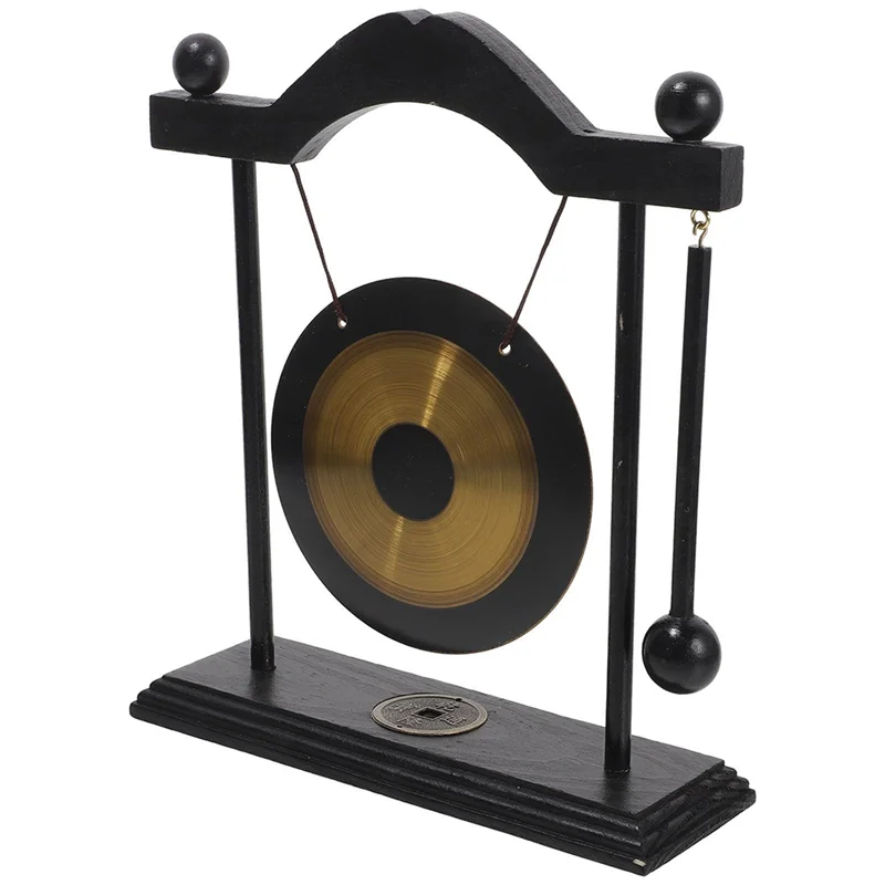 Decorative gong on a stand with a white background