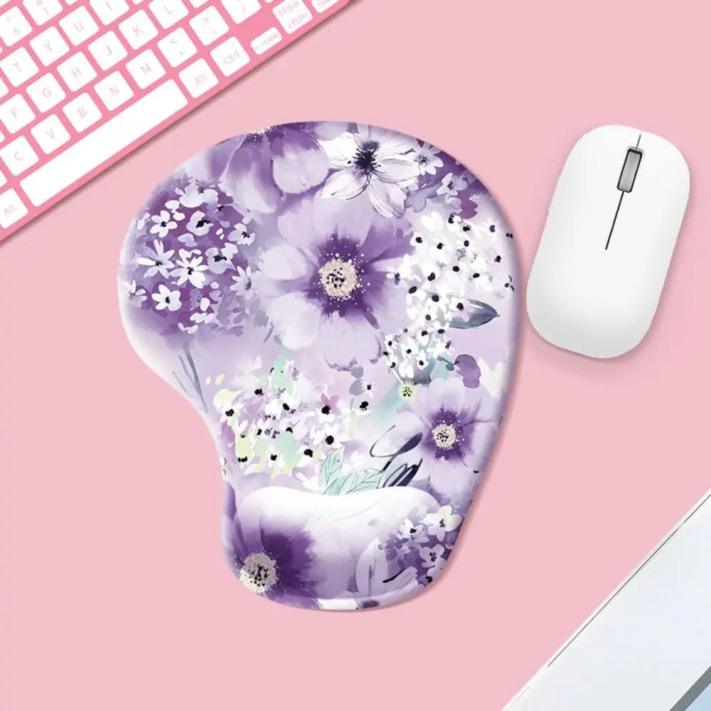 Floral mouse pad with a white mouse on a pink surface