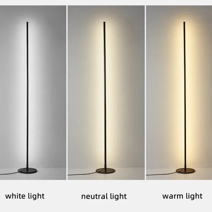 Three floor lamps emitting white, neutral, and warm light on a gray background.