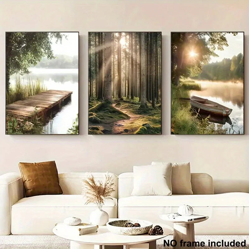 Three framed nature landscapes on a wall above a sofa.