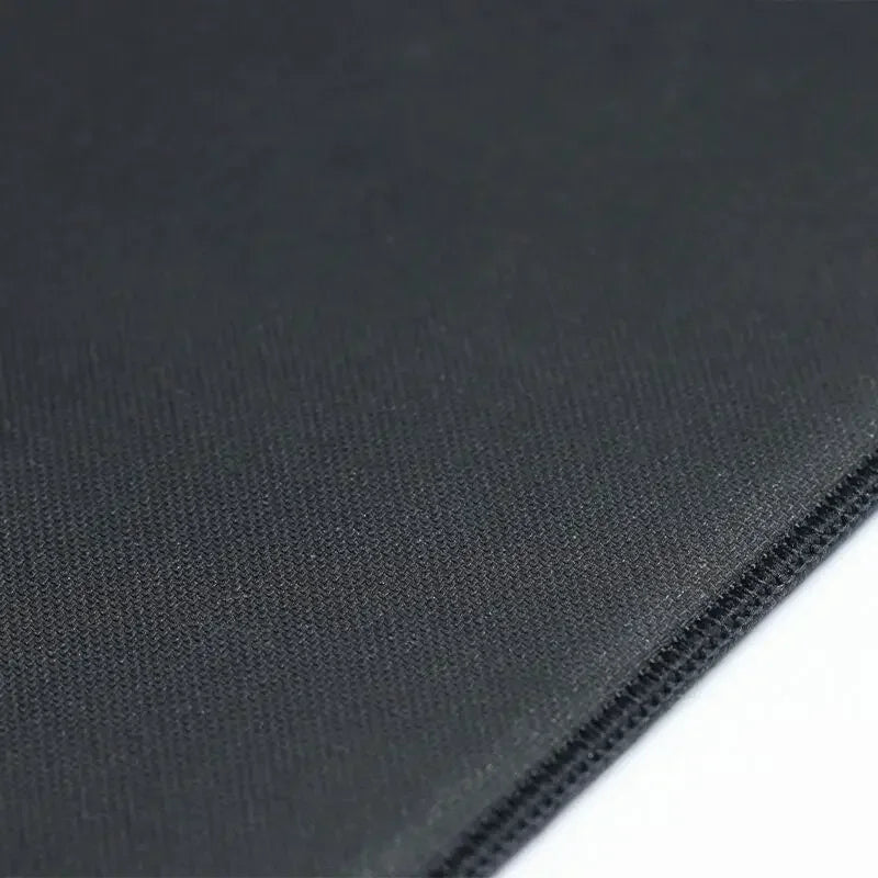 Close-up of black fabric texture on a white background