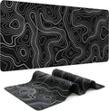 Black extended mouse pad with white contour-line pattern shown flat and folded