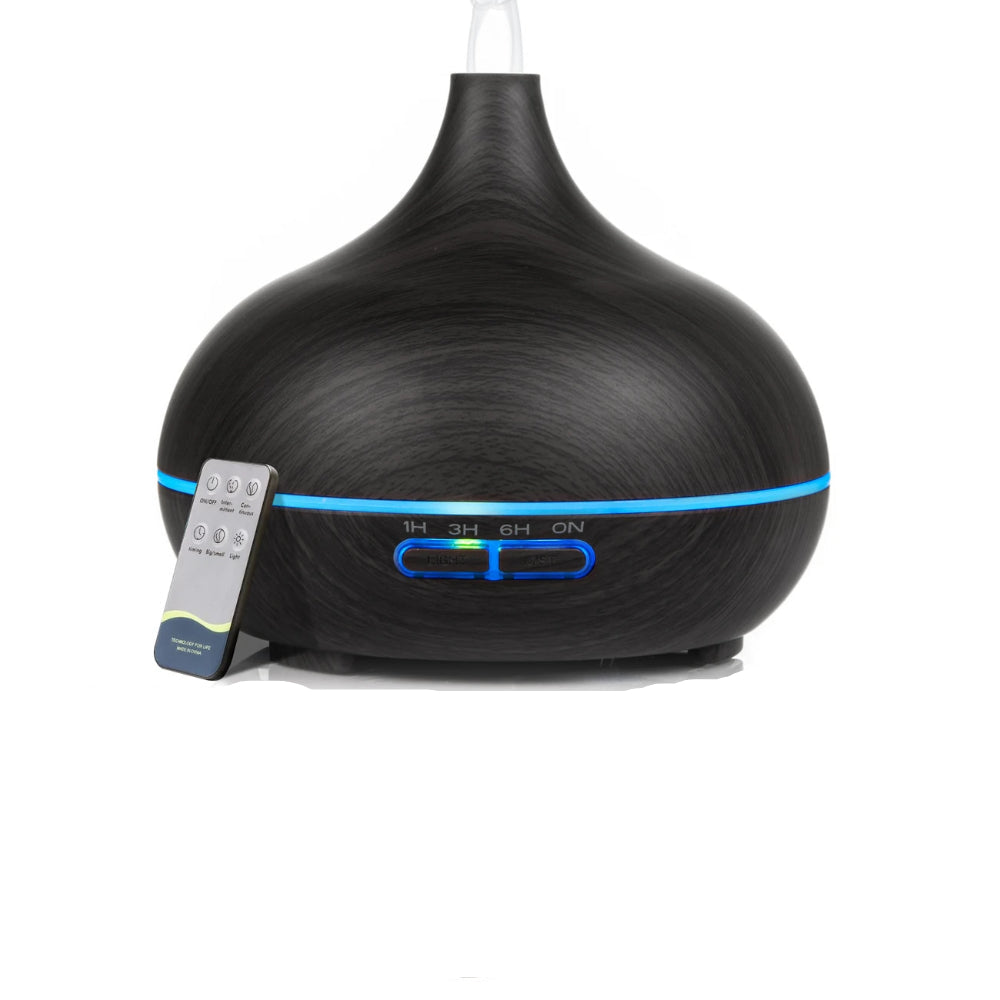 Dark wood-grain aromatherapy diffuser with remote.