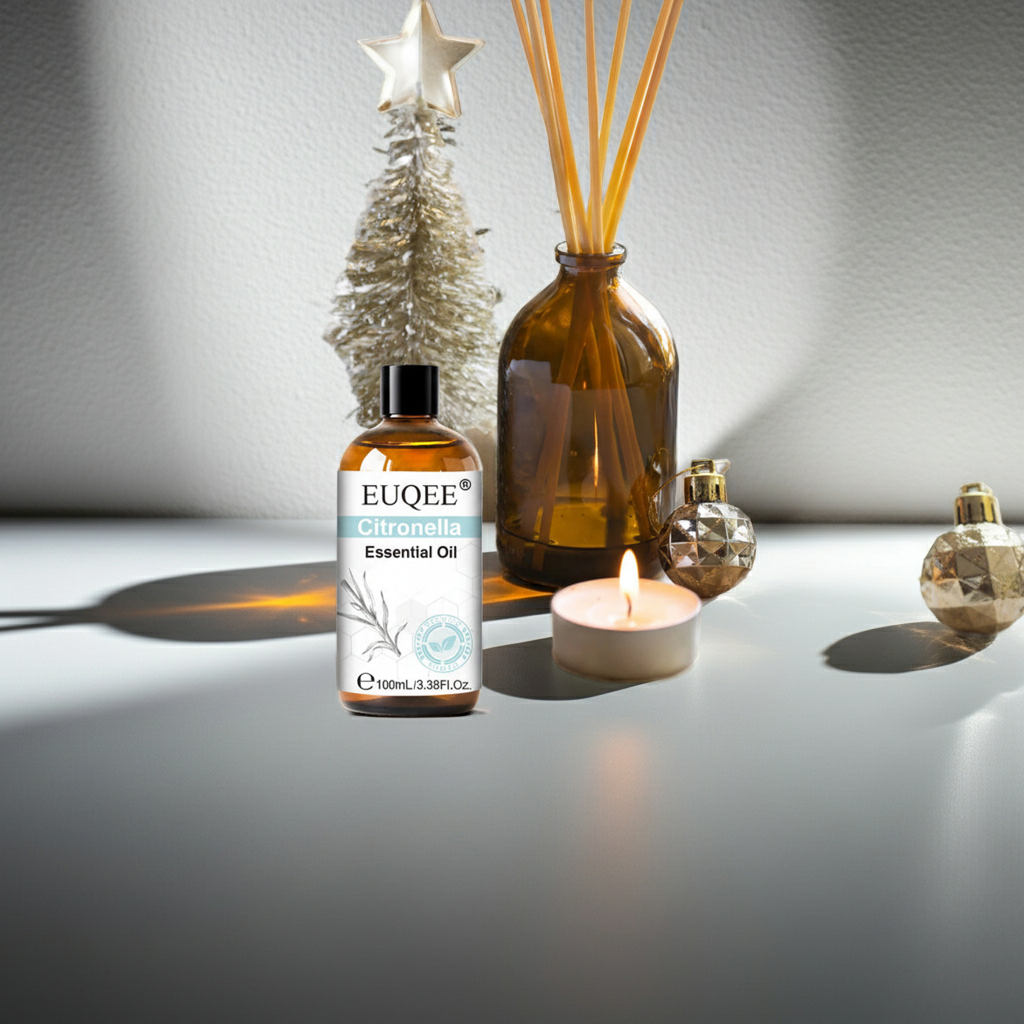 Essential oil bottle with decorative items on a table